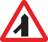 Traffic merges ahead from the left